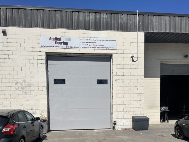 Applied Flooring industrial building, epoxy coatings, concrete polishing services.
